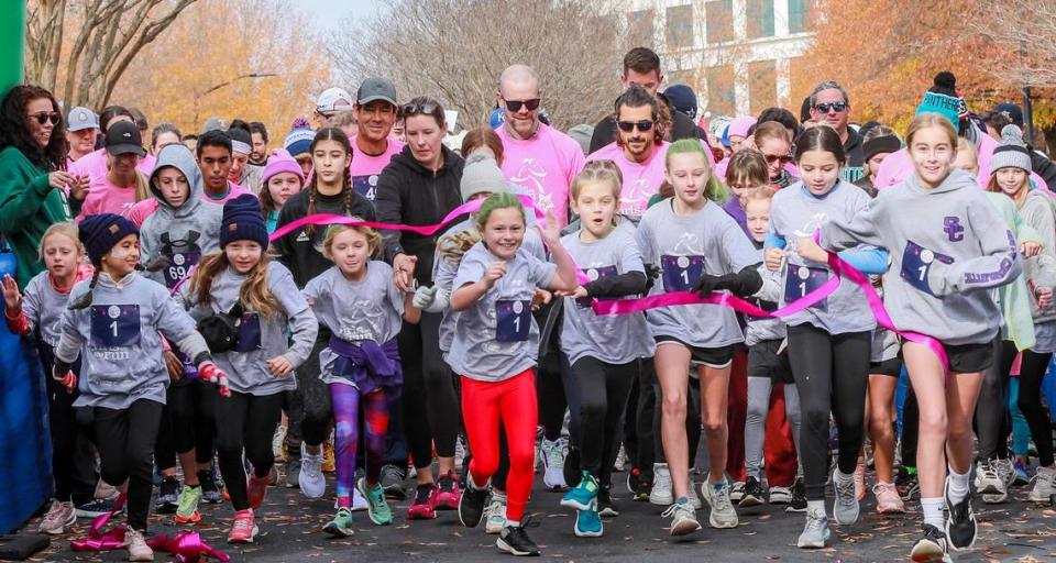 A “Girls on the Run” 5-kilometer race in Charlotte on Dec. 4, 2022. Now a nationwide program for girls in third-eighth grades, “Girls on the Run” began as a Charlotte-based organization in 1996.