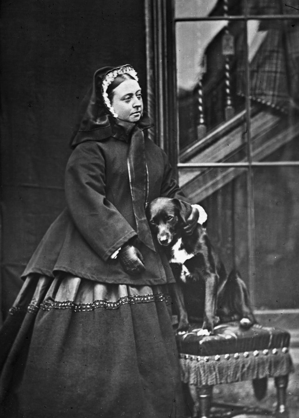 <p>Queen Victoria poses with her dog at Balmoral.</p>