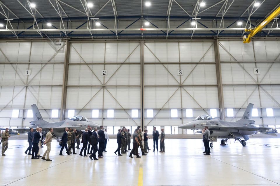 Ukrainian President Volodymyr Zelenskyy and Dutch caretaker Prime Minister Mark Rutte look at F-16 fighter jets in Eindhoven, Netherlands, Sunday, Aug. 20, 2023. The leaders met at a military air base in the southern Dutch city, a day after Zelenskyy visited Sweden on his first foreign trip since attending a NATO summit in Lithuania last month. On Friday, the Netherlands and Denmark said that the United States had given its approval for the countries to deliver F-16s to Ukraine. (AP Photo/Peter Dejong)