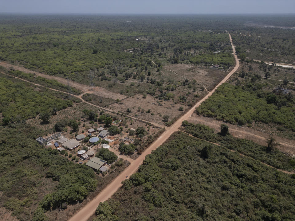 This is an aerial view of Mariama Sonko's agro-ecological training center in the Casamance village of Niaguis, Senegal, Wednesday, March 7, 2024. This quiet village in Senegal is the headquarters of a 115,000-strong rural women's rights movement in West Africa, We Are the Solution. Sonko, its president, is training female farmers from cultures where women are often excluded from ownership of the land they work so closely. (AP Photo/Sylvain Cherkaoui)