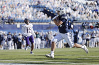BYU linebacker Kavika Fonua (34) runs in for a touchdown in the second quarter against North Alabama during an NCAA college football game Saturday, Nov. 21, 2020, in Provo, Utah. (AP Photo/Jeff Swinger, Pool)