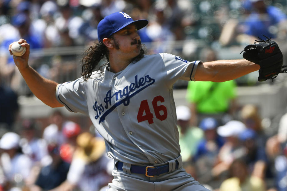 Los Angeles Dodgers' Tony Gosolin pitches against the Atlanta Braves during the first inning of a baseball game Sunday, Aug. 18, 2019, in Atlanta. (AP Photo/John Amis)