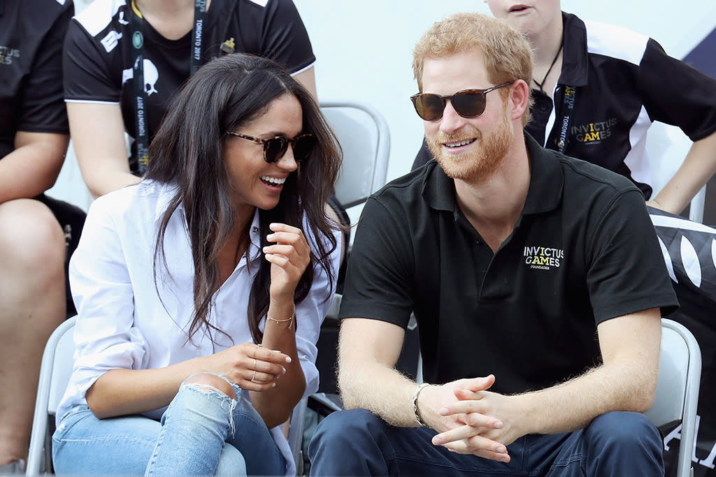 TORONTO, ON – SEPTEMBER 25: Prince Harry (R) and Meghan Markle (L) attend a Wheelchair Tennis match during the Invictus Games 2017 at Nathan Philips Square on September 25, 2017 in Toronto, Canada (Photo by Chris Jackson/Getty Images for the Invictus Games Foundation )