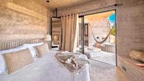 <p>There's no need to decide between adventure or luxury when booking a stay in Cabo, because <a href="https://www.paraderohotels.com/" rel="nofollow noopener" target="_blank" data-ylk="slk:Paradero Todos Santos;elm:context_link;itc:0;sec:content-canvas" class="link ">Paradero Todos Santos</a>, Paradero Hotels's inaugural property, is designed to serve both. This upscale bohemian retreat is created to be a haven for surfers, outdoor enthusiasts, and wellness junkies looking for their perfect slice of paradise. The resort was designed by Mexico City–based Polen, who was behind the landscape design of Google and Twitter's Mexico offices. Paradero Todo Santos will feature a 100,000-square-foot botanical garden alongside sweeping views of the ocean, mountains, and farmlands. You won't want to miss Ojo de Agua, the below-ground spa that is inspired by a secret local watering hole that features centuries-old ingredients and traditions for rejuvenating the mind and body.</p><p><em>Paradero Todos Santos opened in February 2021. Nightly rates start at $550.</em></p>