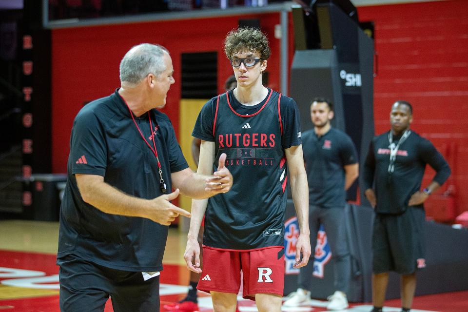Head coach Steve Pikiell coaches Gavin Griffiths during Rutgers men's basketball media day at Jersey Mike's Arena in Piscataway, NJ Tuesday, October 3, 2023.