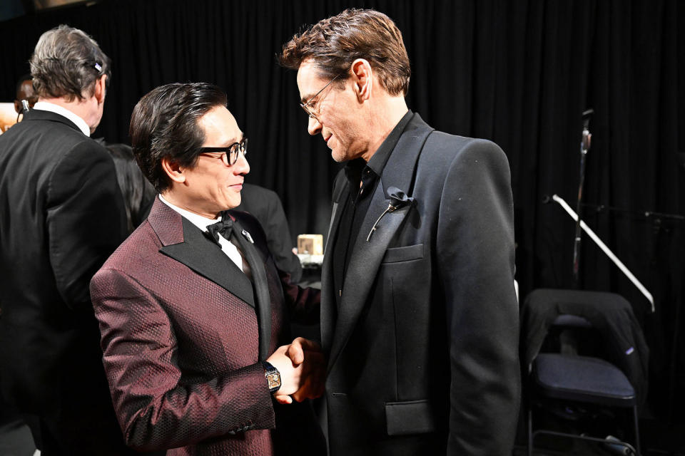 Ke Huy Quan and Robert Downey Jr. seen backstage  (Richard Harbaugh / Getty Images)