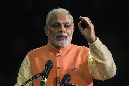India's Prime Minister Narendra Modi speaks at Madison Square Garden in New York, during his visit to the United States, September 28, 2014. REUTERS/Lucas Jackson
