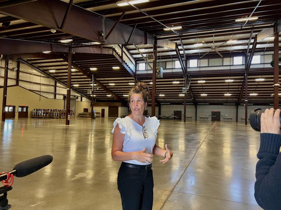 Lilly Palmer shows journalists around Furhman hall, the venue where Germanfest is held each year