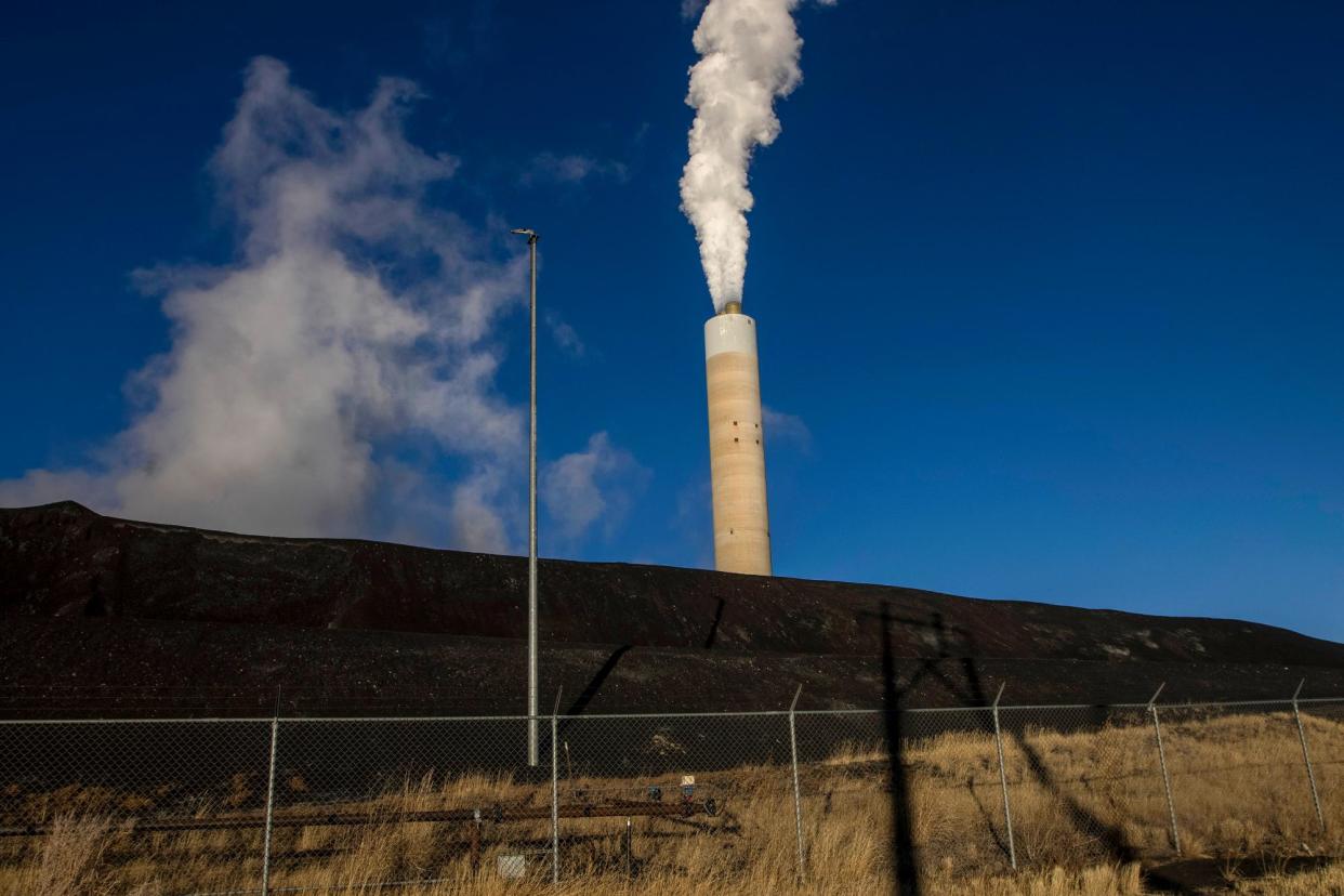<span>Emissions rise from a smokestack at a coal-fired power plant in Kemmerer, Wyoming, on 22 November 2022.</span><span>Photograph: Natalie Behring/Getty Images</span>