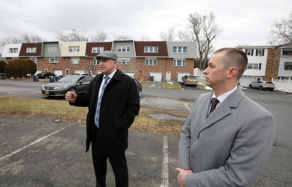 New York State Police Investigators Brad Natalizio, left, and Michael Corletta at Greenway Terrace in Middletown Feb. 17, 2022. Megan McDonald was seen there on the night of her disappearance. 