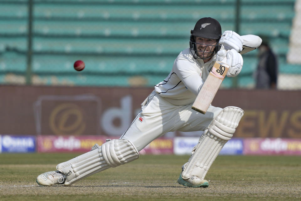 New Zealand's Tom Blundell plays a shot during the third day of first test cricket match between Pakistan and New Zealand, in Karachi, Pakistan, Wednesday, Dec. 28, 2022. (AP Photo/Fareed Khan)