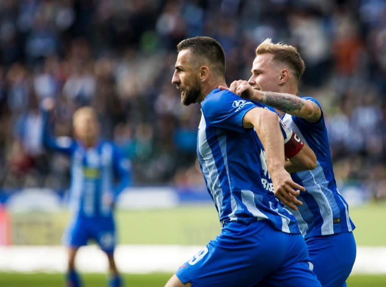 Hertha Berlin captain Vedad Ibisevic (C) scored twice in the 4-2 win over Borussia Moenchengladbach at the Olympic stadium to leave his side second in the table