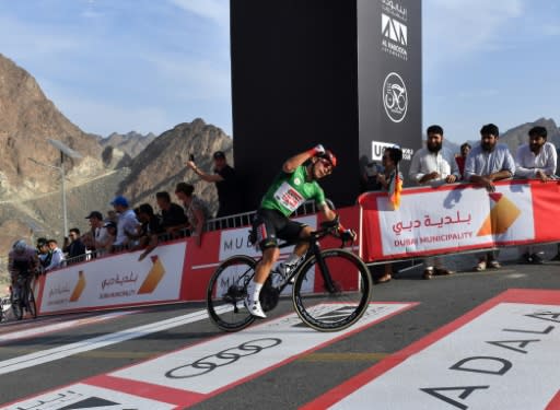 Caleb Ewan crosses the finish line to win the second stage of the UAE Cycling Tour from Hatta to Hatta Dam