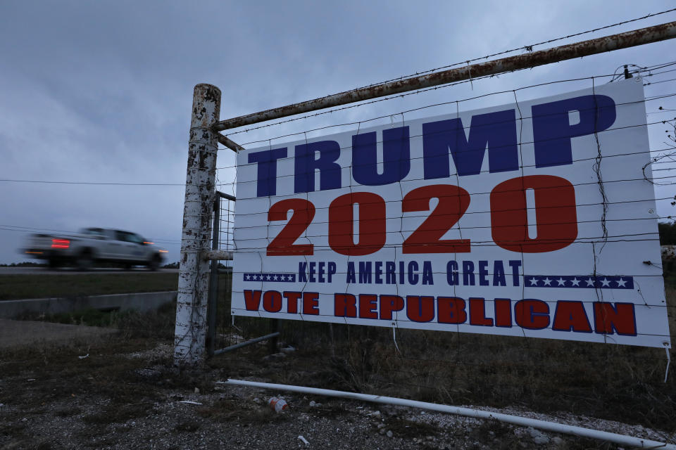 JOHNSON CITY, TX - MARCH 03: A motorist passes a Trump 2020 sign on March 3, 2020 in Johnson City, Texas. 1,357 Democratic delegates are at stake as voters cast their ballots in 14 states and American Samoa on what is known as Super Tuesday. (Photo by Edward A. Ornelas/Getty Images)