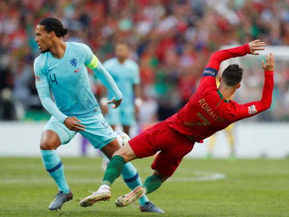 Van Dijk brushes off Ronaldo during Nations League final (Reuters)