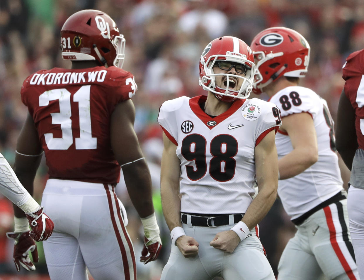 Rodrigo Blankenship celebrates a monstrous 55-yard field goal in the Rose Bowl. (AP)