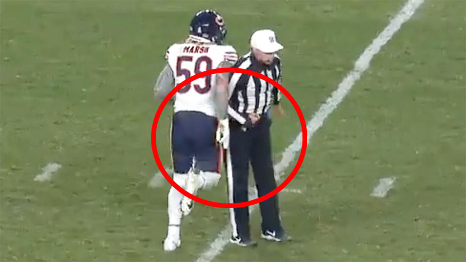 NFL fans have reacted angrily after NFL referee Tony Corrente appeared to deliberately hip check Chicago's Cassius Marsh, before then throwing a flag on the previous play for taunting. Picture: ESPN