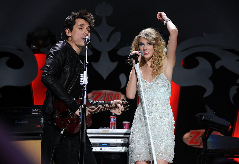 John Mayer and Taylor Swift perform onstage during Z100’s Jingle Ball 2009. Photo by Theo Wargo/WireImage for Clear Channel Radio New York