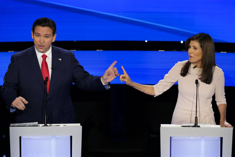 FILE - Former UN Ambassador Nikki Haley, right and Florida Gov. Ron DeSantis, left, pointing at each other during the CNN Republican presidential debate at Drake University in Des Moines, Iowa, Jan. 10, 2024. In 2024, Iowa will again hold the first Republican contest. (AP Photo/Andrew Harnik, File)