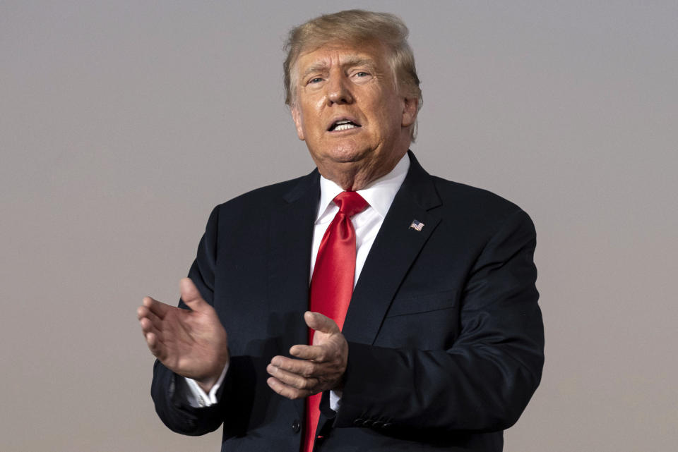 FILE - In this Sept. 25, 2021, file photo, former President Donald Trump prepares to take the stage during his Save America rally in Perry, Ga. Supporters of Republican Georgia Gov. Brian Kemp are fighting back against Donald Trump and their own party leaders. They are angered by Trump’s Sept. 25 rally in Georgia where the former president again attacked Kemp. (AP Photo/Ben Gray, File)