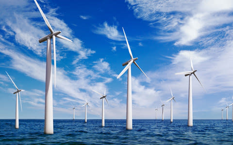 An offshore wind farm in the UK - Credit: Alamy