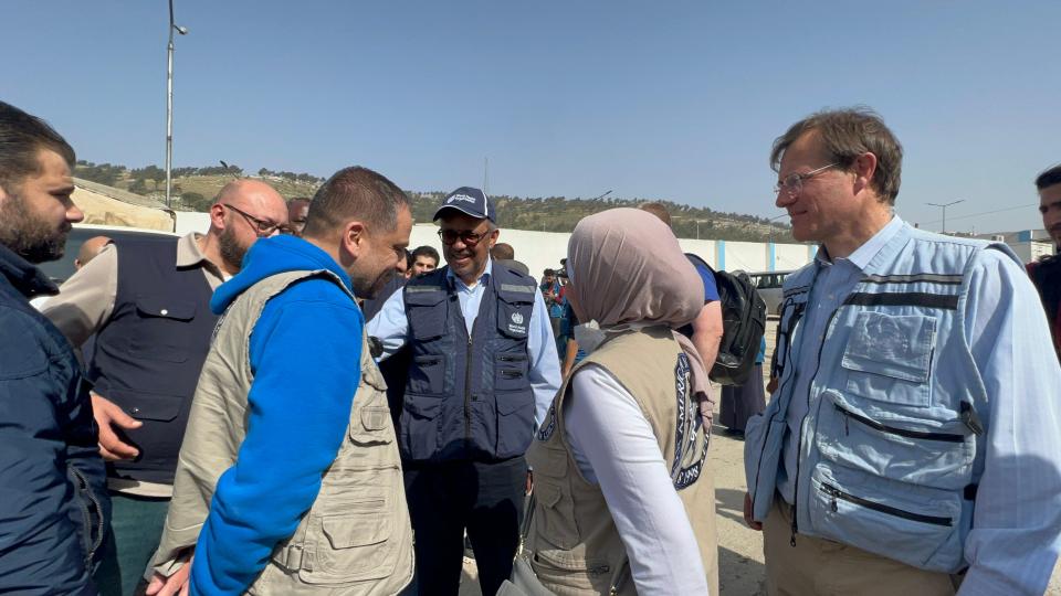 WHO Director-General Tedros Adhanom Ghebreyesus, center, visits northwestern Syria on March 1, 2023, after devastating earthquakes that hit northern Syria and southern Turkey in February.