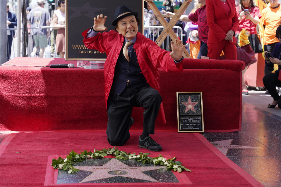 FILE - Actor James Hong poses after being honored with a star on the Hollywood Walk of Fame on May 10, 2022, in the Hollywood section of Los Angeles. has a starring role in the new “Gremlins” animated prequel, “Secrets of the Mogwai,” and pops up in “American Born Chinese” on Disney+. (AP Photo/Mark J. Terrill, File)