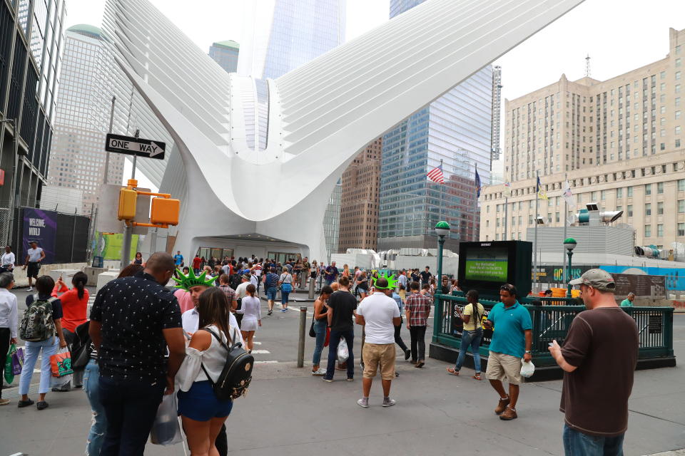 <p>Vendors seek out tourists along Church Street across from the recently opened World Trade Center Transportation Hub in New York City, Aug. 12, 2017. (Photo: Gordon Donovan/Yahoo News) </p>