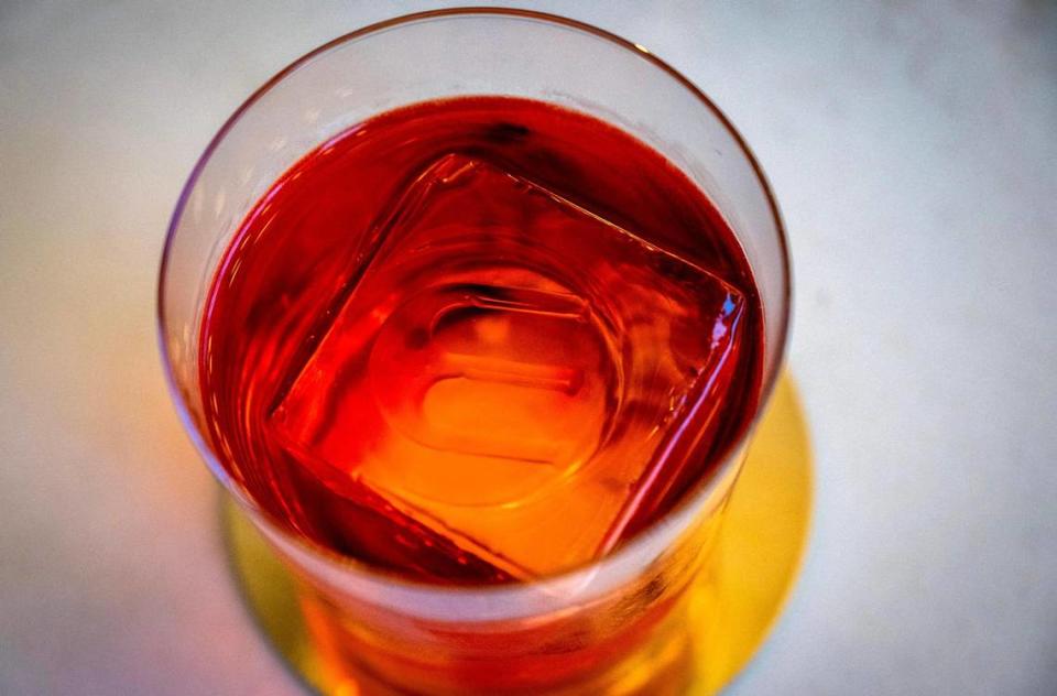 Bar Medici’s Negroni Pisco is served with an ice cube stamped with the bar’s logo.