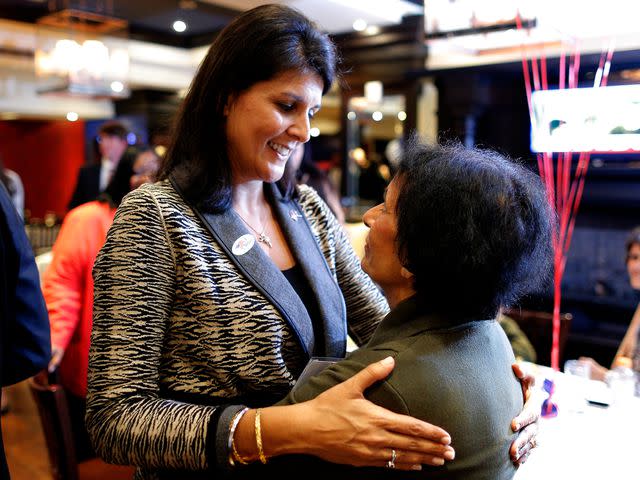 <p>Stephen B. Morton/AP</p> Nikki Haley is congratulated by her mother, Raj Randhawa, at campaign headquarters on Nov. 4, 2014 in Columbia, S.C.
