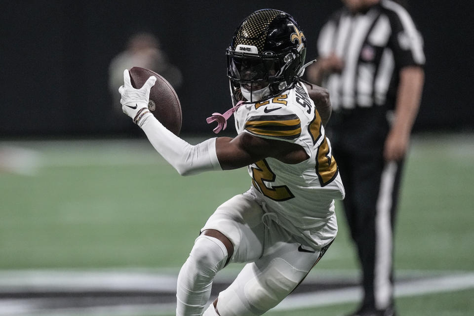 New Orleans Saints wide receiver Rashid Shaheed (22) runs against the Atlanta Falcons during the first half of an NFL football game, Sunday, Nov. 26, 2023, in Atlanta. (AP Photo/John Bazemore)