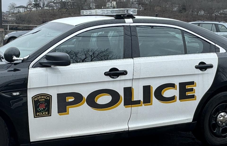 A Norwich police car parked at the department's headquarters at 70 Thames St. Members of the department responded to shots fired in the area of Cliff Street and North Cliff Street in Norwich on Monday.