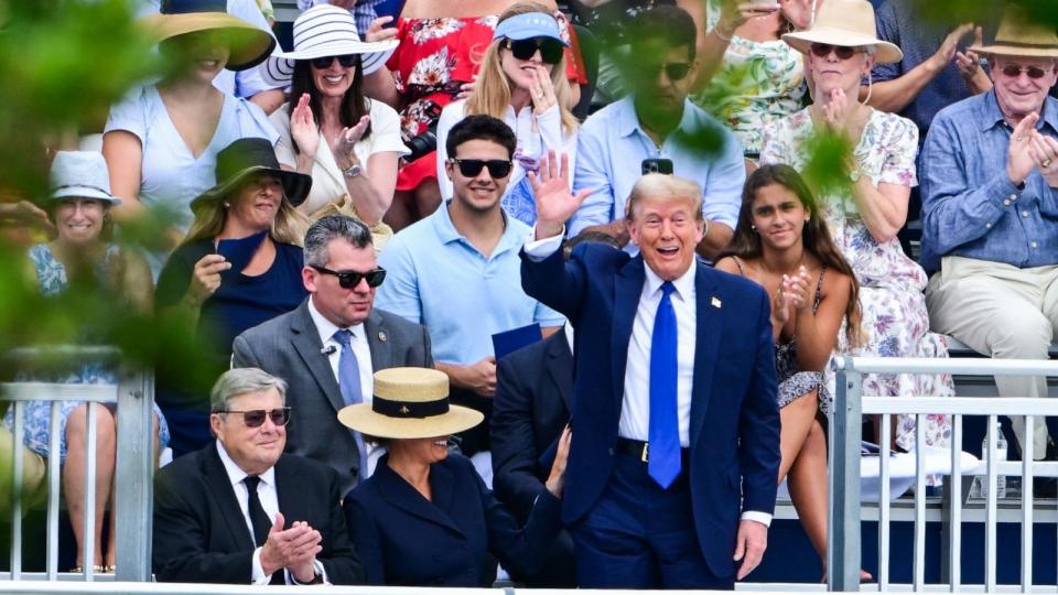 PHOTO: Former President Donald Trump waves as he attends the graduation ceremony of his son, Barron Trump, at Oxbridge Academy in Palm Beach, Fla., May 17, 2024. (Giorgio Viera/AFP via Getty Images)