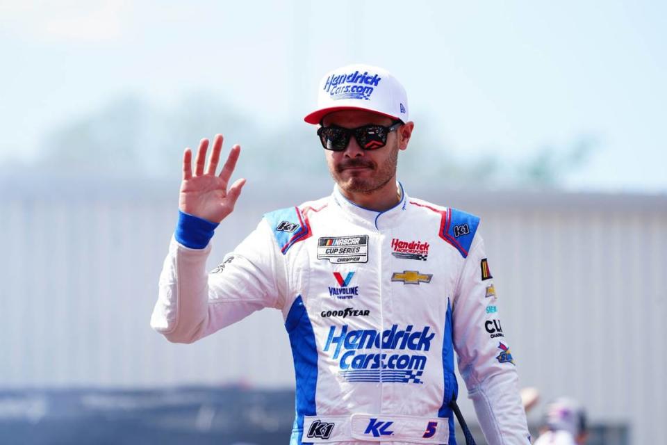 Apr 2, 2023; Richmond, Virginia, USA; Kyle Larson (5) reacts with fans before the race during the Toyota Owners 400 at Richmond Raceway. Mandatory Credit: John David Mercer-USA TODAY Sports