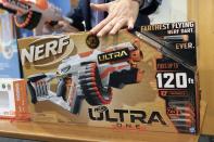 James Swartz, director of World Against Toys Causing Harm, talks about the dangers of the Nerf Ultra One, during a news conference in Boston, Tuesday, Nov. 19, 2019. The organization says the Nerf Ultra One gun, which is billed as firing soft darts up to 120 feet, shoots the projectiles with enough force to potentially cause eye injuries. (AP Photo/Michael Dwyer)