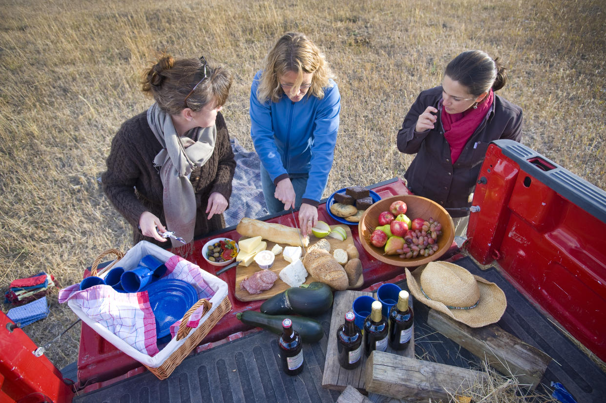 Your tailgate party doesn't have to be all burgers and brats. Get expert tips for upgrading those pre-game snacks. (Photo: Getty Creative)