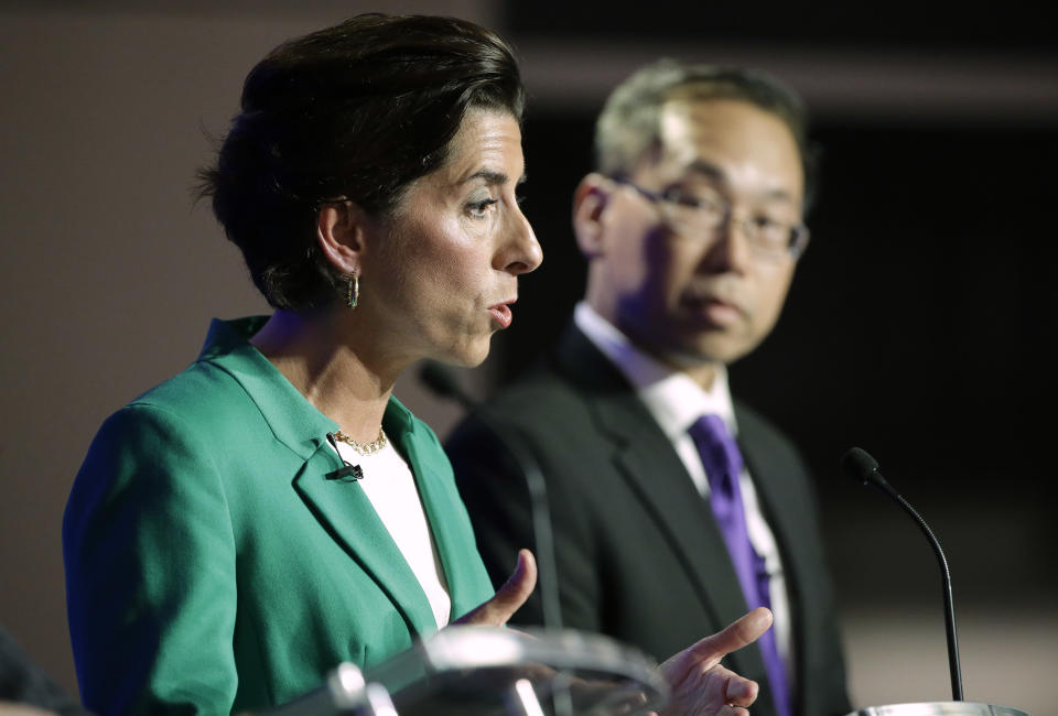 Rhode Island gubernatorial candidates Democratic Gov. Gina Raimondo, left, and Republican Cranston Mayor Allan Fung, right, participate in a televised debate, Thursday, Sept. 27, 2018, in Bristol, R.I. (AP Photo/Steven Senne)