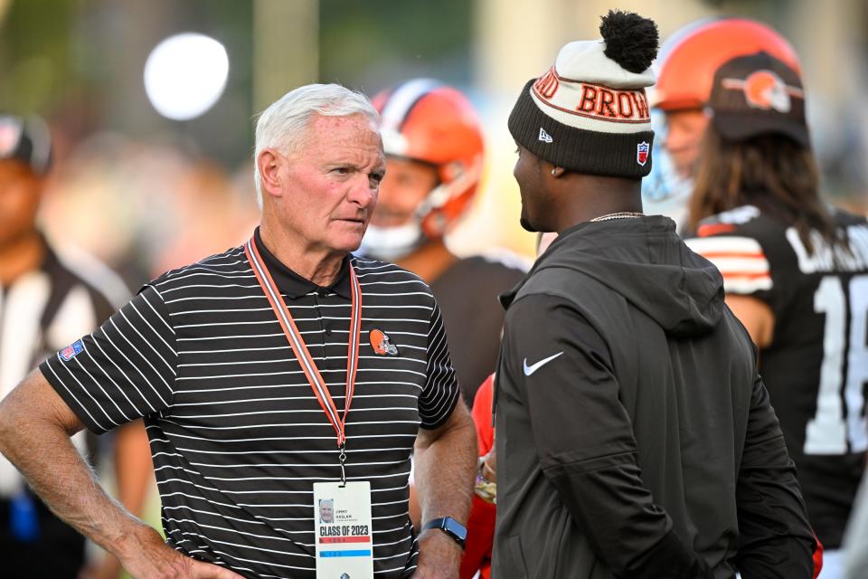 Cleveland Browns owner Jimmy Haslam, left, talks with quarterback Deshaun Watson before the team's Hall of Fame NFL football preseason game against the New York Jets, Thursday, Aug. 3, 2023, in Canton, Ohio. (AP Photo/David Richard)