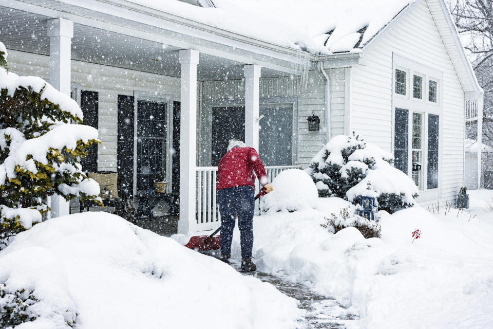 Shovelling snow has been linked to a spike in slip and falls — and heart attacks. (Image via Getty Images)