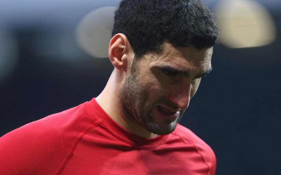 Marouane Fellaini has injured his calf and will be unavailable for Manchester United for up to a month, ruining any chance of leaving in the January transfer window - Manchester United
