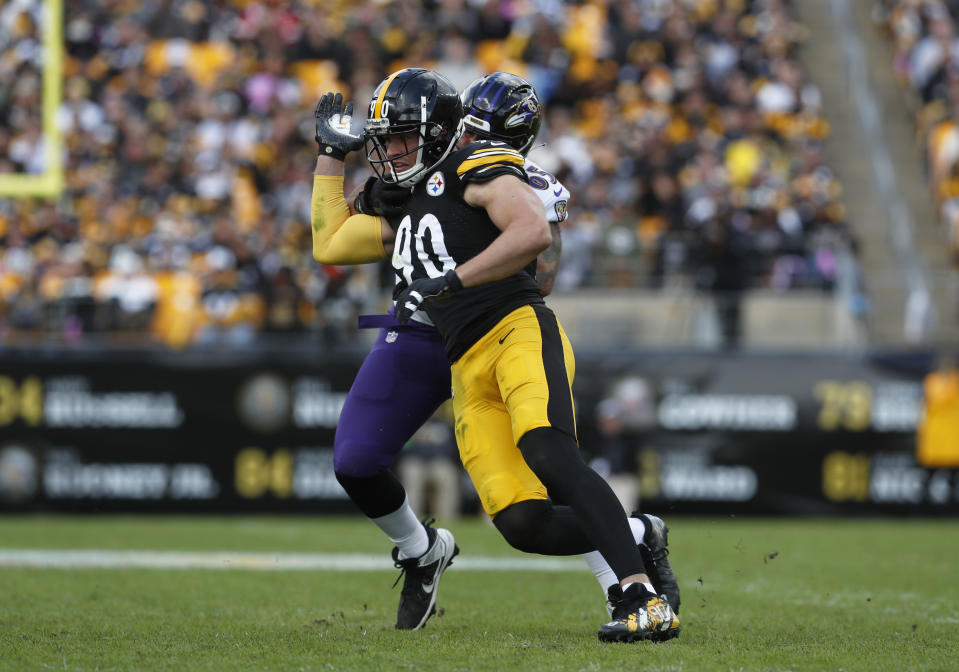 Oct 8, 2023; Pittsburgh, Pennsylvania, USA; Pittsburgh Steelers linebacker T.J. Watt (90) pass rushes at the line of scrimmage past <a class="link " href="https://sports.yahoo.com/nfl/teams/baltimore/" data-i13n="sec:content-canvas;subsec:anchor_text;elm:context_link" data-ylk="slk:Baltimore Ravens;sec:content-canvas;subsec:anchor_text;elm:context_link;itc:0">Baltimore Ravens</a> guard <a class="link " href="https://sports.yahoo.com/nfl/players/32315" data-i13n="sec:content-canvas;subsec:anchor_text;elm:context_link" data-ylk="slk:Patrick Mekari;sec:content-canvas;subsec:anchor_text;elm:context_link;itc:0">Patrick Mekari</a> (rear) during the second quarter at Acrisure Stadium. Pittsburgh won 17-10. Mandatory Credit: Charles LeClaire-USA TODAY Sports