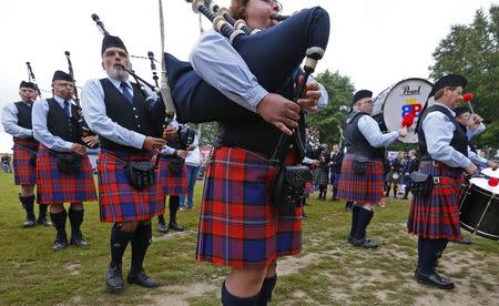 Competitors take part in the Belgian Pipe Band Championship during the Scottish Weekend event in Belgium's Flanders village of Bilzen September 13, 2014. REUTERS/Yves Herman