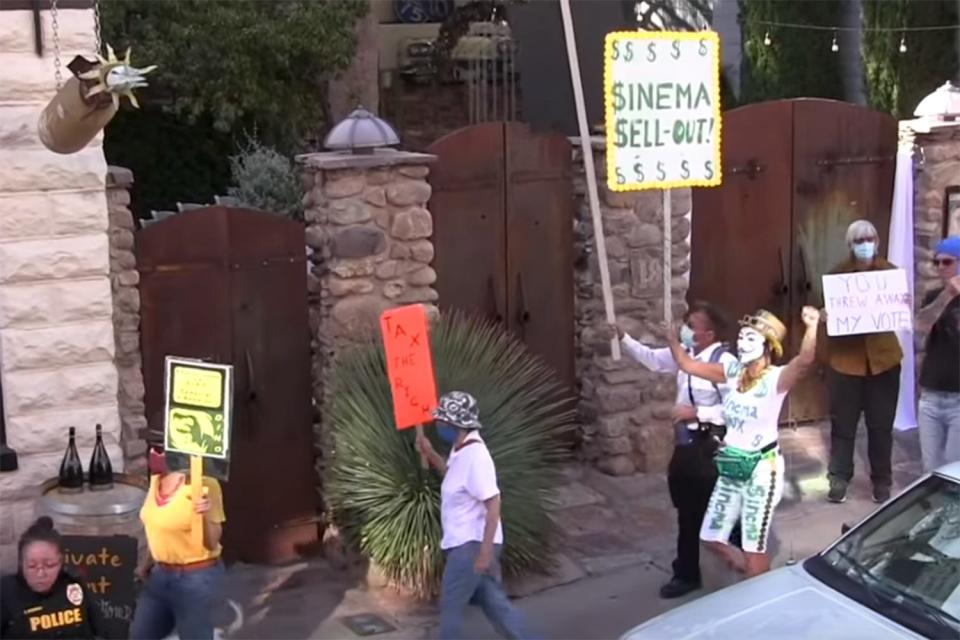 Krysten Sinema protests