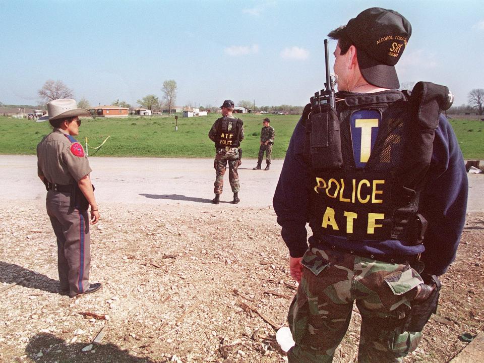 ATF agents standing at a checkpoint near the Branch Davidian compound in March 1993.