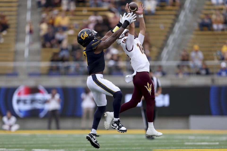 Arizona State quarterback Trenton Bourguet (16) catches a pass over California linebacker David Reese (7) during the first half of an NCAA college football game in Berkeley, Calif., Saturday, Sept. 30, 2023. (AP Photo/Jed Jacobsohn)