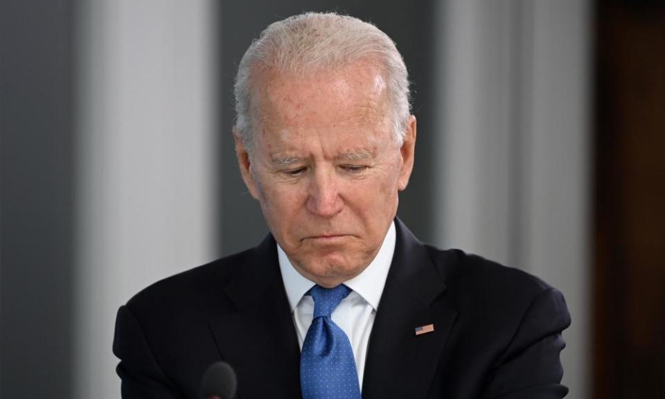 Close up of Joe Biden looking down, as though at his notes or a document