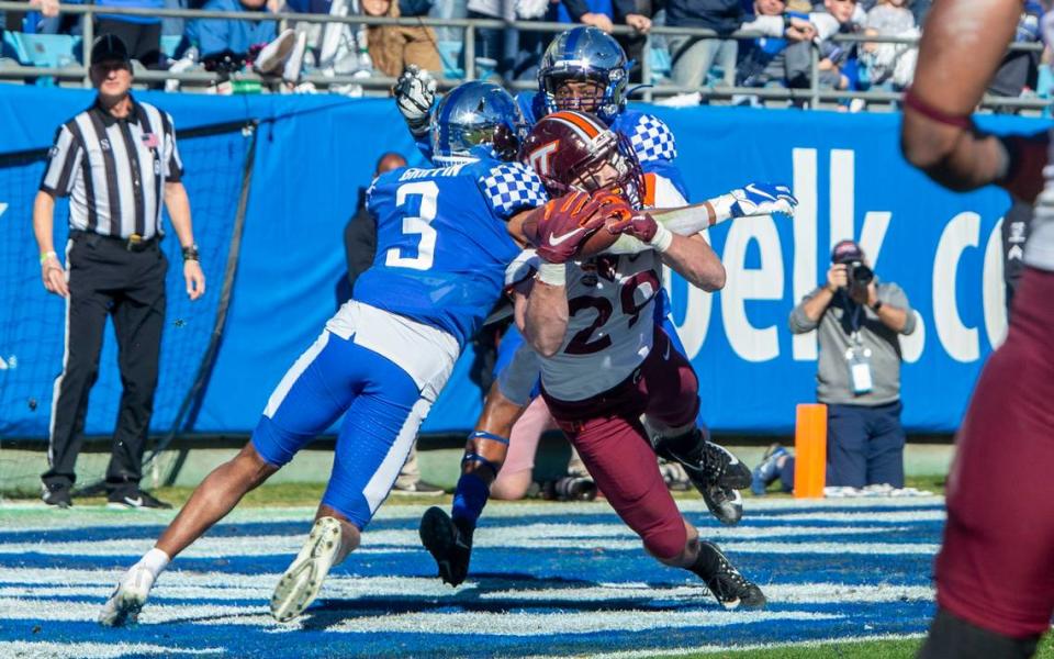 Virginia Tech’s Dalton Keene reels in a pass for a touchdown against Kentucky’s Jordan Griffin, left, and Quandre Mosely during the Belk Bowl at the Bank of America Stadium in Charlotte, NC on Tuesday, December 31, 2019. 