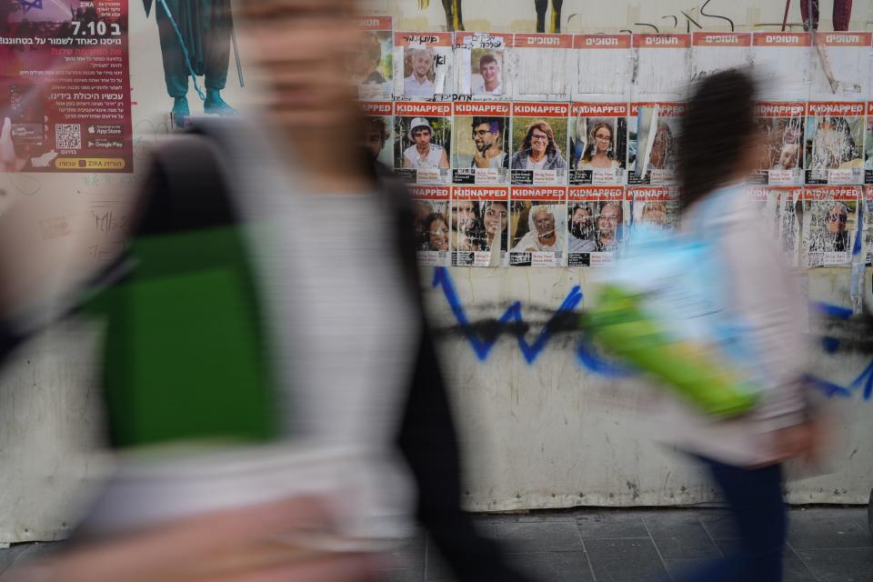 Kidnapped posters line a wall in Jerusalem as the nation marks six months since the start of the war. Over 200 people were taken hostage by Hamas-led militants in October.