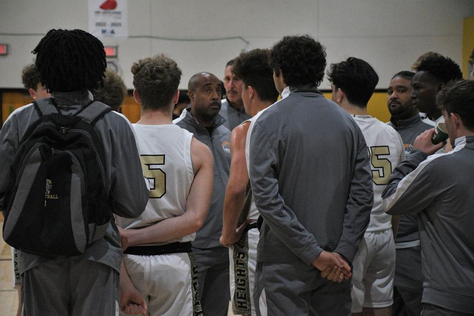 Olympic Heights' head coach Keith Mackrey (center) against South Plantation during the South County Martin Luther King Classic on Monday, Jan. 16, 2023.