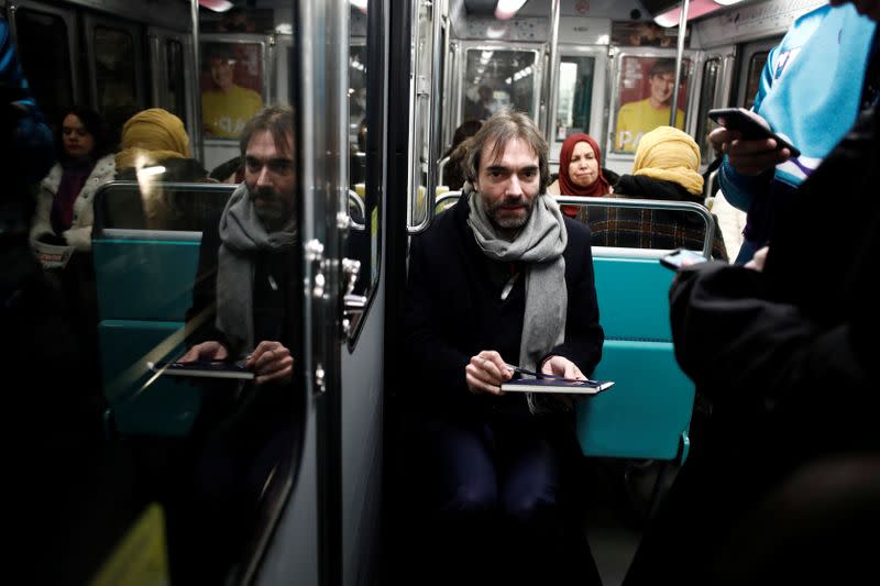 French mathematician Cedric Villani, member of Parliament and candidate for Paris mayoral election, campaigns in Paris